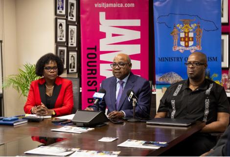 Hon. Edmund Bartlett (centre), Minister of Tourism, addresses the media during a press briefing for the 2025 Global Tourism Resilience Conference, set to be held in Hanover from February 16-19, 2025. Joining him are Jennifer Griffith (left), Permanent Secretary in the Ministry of Tourism, and Professor Lloyd Waller (right), Executive Director of the Global Tourism Resilience and Crisis Management Centre (GTRCMC).
