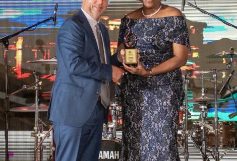 Jason Henzell (left), chairman of Jakes Hotel, Villas & Spa, the premier resort establishment in Treasure Beach, St. Elizabeth receives a Global Tourism Resilience award from Permanent Secretary in the Ministry of Tourism, Jennifer Griffith during a special awards ceremony at the Princess Grand Jamaica resort on February 18, 2025. The award was presented at a gala dinner, climaxing the 3rd Global Tourism Resilience Conference and Expo with delegates coming from as far as Africa.