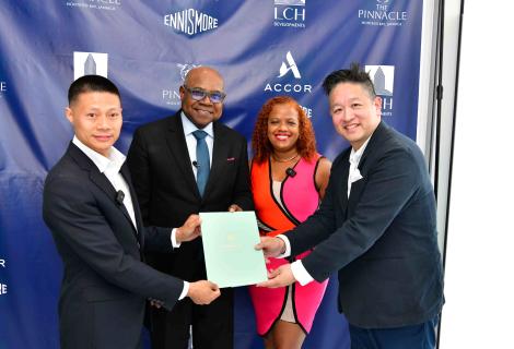 A significant step for Jamaica’s tourism sector: Minister of Tourism, Hon. Edmund Bartlett (2nd left) joins LCH Developments CEO, Yangsen Li (left) and COO, Tanya Golaub (2nd right) alongside Ennismore's EVP – Americas, Jason Hsiang (right) at the signing ceremony announcing The Pinnacle's collaboration with Ennismore and Accor to introduce their prestigious luxury lifestyle brands to the island.