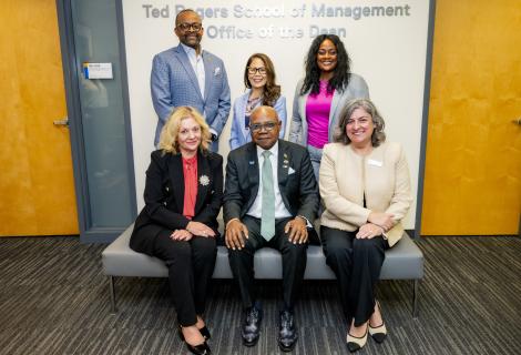  Seated, Minister of Tourism, Hon Edmund Bartlett (C) with Roberta Iannacito-Provenzano, Provost and Vice-President, Academic, Toronto Metropolitan University (TMU) (L) and Cynthia Holmes, Dean, Ted Rogers School of Management, TMU. Sharing in the moment are standing L-R, Donovan White, Director of Tourism, Donnette Chin-Loy, Chancellor TMU and Angella Bennett, Regional Director, Canada. The occasion was the tour of the University to discuss tourism opportunities and partnership.