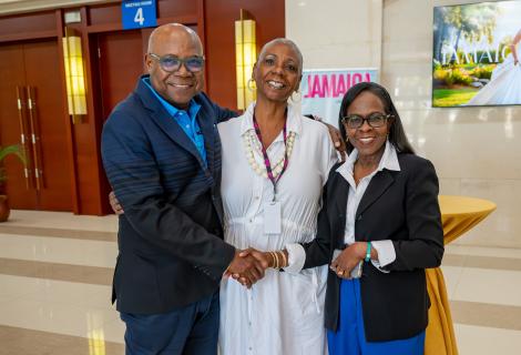 Minister Bartlett (left) shares a quick photo with two participants in the Jamaica Bridal Expo 2025 held at the Montego Bay Convention Centre (MBCC) on Saturday, September 27, 2025. 
