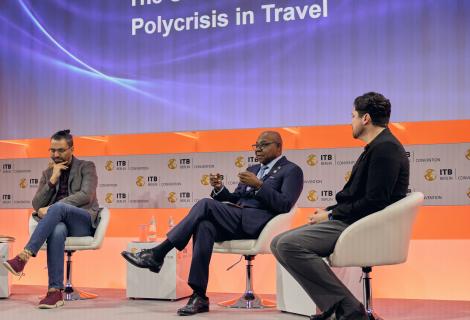 Minister of Tourism, Hon Edmund Bartlett (c) makes his presentation during a panel discussion on ‘The Understanding: Polycrisis in Travel’ at ITB, Berlin on Tuesday March 3, 2026. Seen also are L-R panellists, Aziz Abu Sarah, Co-Founder bei ME JDI Tours and Stephen Dutton, Global Insight Manager, Travel bei Euromonitor International. 