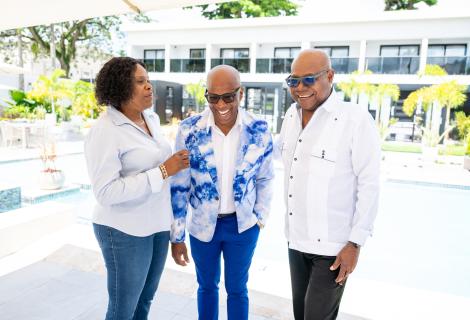 . Minister of Tourism, Hon. Edmund Bartlett (right) shares a light moment with The Garden Hotel’s Chief Executive Officer, Garfield Virgin (centre) and Permanent Secretary in the Ministry of Tourism, Jeniffer Griffith, as they discuss the great potential of the property at the start of the Ministry’s two-day South Coast Confidence Tour on Thursday, April 23, 2026. 