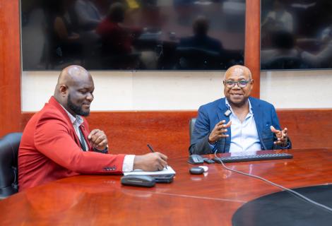 Recently elected president of the Jamaica Hotel and Tourist Association (JHTA), O’Brian Heron (left) makes copious notes as he listens keenly to Minister of Tourism, Hon Edmund Bartlett during a courtesy call by the new JHTA executive on the minister on Thursday, July 16, 2026, at the Montego Bay Convention Centre.