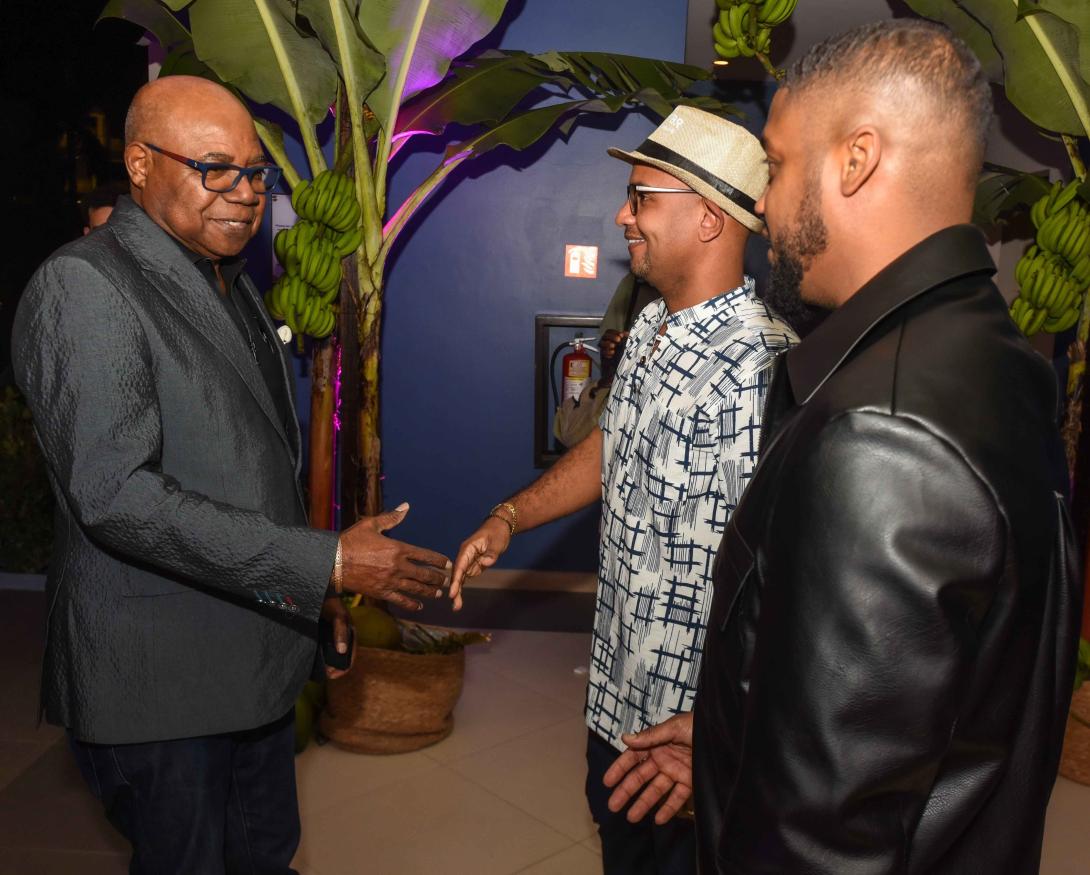 Co-founders of TechBeach, Jamaican Kirk Hamilton (centre) and Trinidadian Kyle Maloney (right), greet Minister of Tourism, Hon Edmund Bartlett on his arrival for the official opening of the 7th TechBeach Retreat, at Secret Resorts on Wednesday, December 4, 2024.