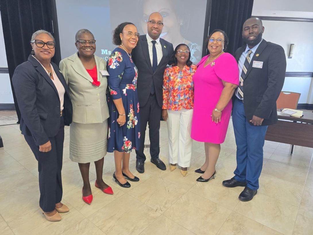 Senator the Hon. Delano Seiveright, Minister of State in the Ministry of Tourism (centre), is pictured with (from left) Ms. Shernette Crichton, General Manager of Half Moon Resort; Ms. Paulette Foster-Christie, Acting Head of the School of Hospitality, Tourism & Creative Studies at Montego Bay Community College (MBCC); Dr. Angela Samuels-Harris, Former Principal of MBCC; Ms. Ann-Marie Burgess, Lecturer; Carol Walters, Former Vice President of Academics, MBCC; and Charles Ramsay, Lecturer.
