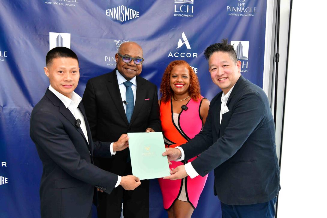 A significant step for Jamaica’s tourism sector: Minister of Tourism, Hon. Edmund Bartlett (2nd left) joins LCH Developments CEO, Yangsen Li (left) and COO, Tanya Golaub (2nd right) alongside Ennismore's EVP – Americas, Jason Hsiang (right) at the signing ceremony announcing The Pinnacle's collaboration with Ennismore and Accor to introduce their prestigious luxury lifestyle brands to the island.