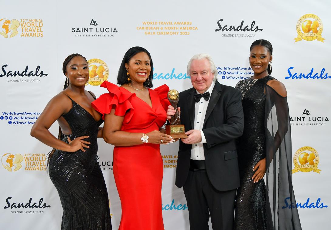 Mureen James, Executive Director of the Montego Bay Convention Centre (2nd left) shares a photo opportunity with Graham Cooke Head of the World Travel Awards (2nd right) at the Caribbean and North America Gala in St. Lucia on October 4. 