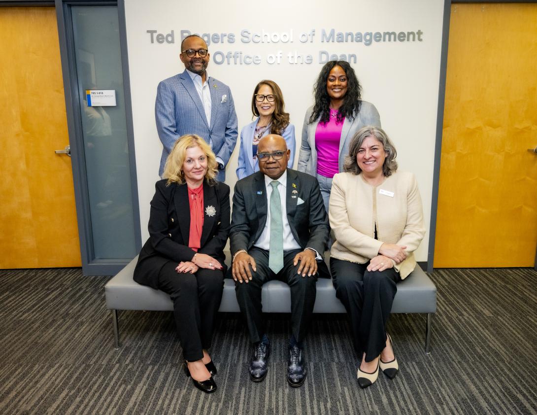 Seated, Minister of Tourism, Hon Edmund Bartlett (C) with Roberta Iannacito-Provenzano, Provost and Vice-President, Academic, Toronto Metropolitan University (TMU) (L) and Cynthia Holmes, Dean, Ted Rogers School of Management, TMU. Sharing in the moment are standing L-R, Donovan White, Director of Tourism, Donnette Chin-Loy, Chancellor TMU and Angella Bennett, Regional Director, Canada. The occasion was the tour of the University to discuss tourism opportunities and partnership.