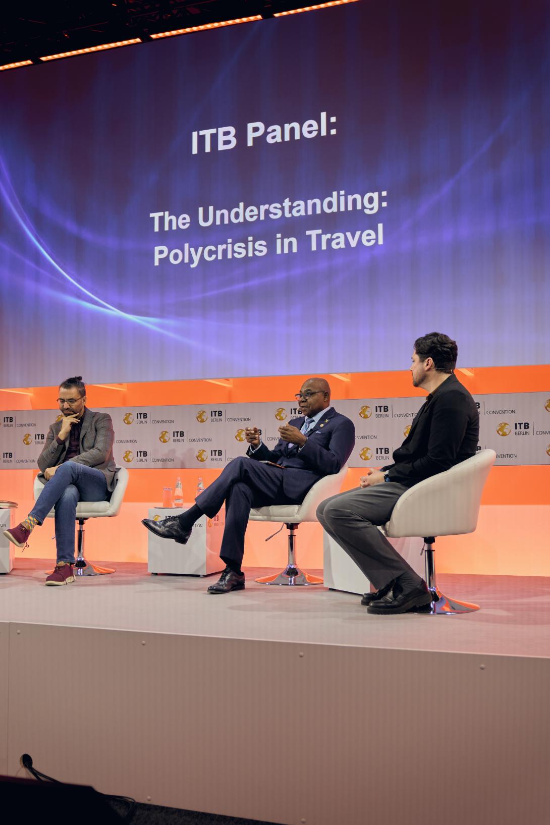 Minister of Tourism, Hon Edmund Bartlett (c) makes his presentation during a panel discussion on ‘The Understanding: Polycrisis in Travel’ at ITB, Berlin on Tuesday March 3, 2026. Seen also are L-R panellists, Aziz Abu Sarah, Co-Founder bei ME JDI Tours and Stephen Dutton, Global Insight Manager, Travel bei Euromonitor International. 