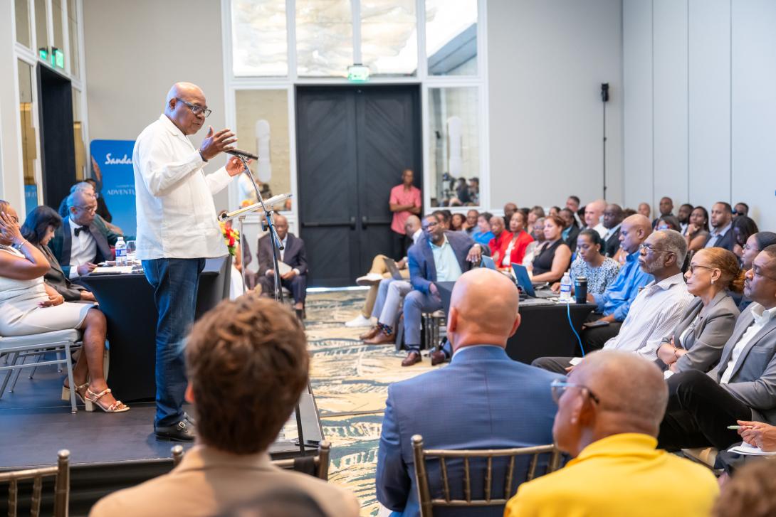 Minister of Tourism, Hon. Edmund Bartlett (standing) has a captive audience as all eyes are focused on him during his address recently to the 65th annual general meeting of the Jamaica Hotel and Tourist Association (JHTA), at Sandals Dunns River, St. Ann. The Minister put the JHTA on notice that it will be required to play a leading role in driving the new Tourism 3.0 growth agenda across the entire sector. 